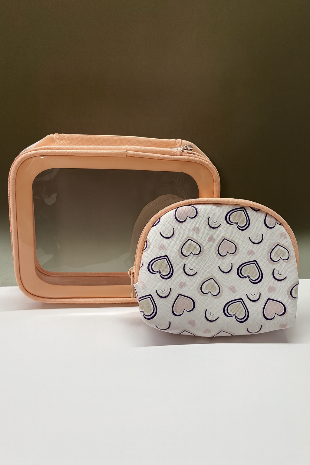 Set Cosmetiquera Transparente + Mini Cosmetiquera de Corazones